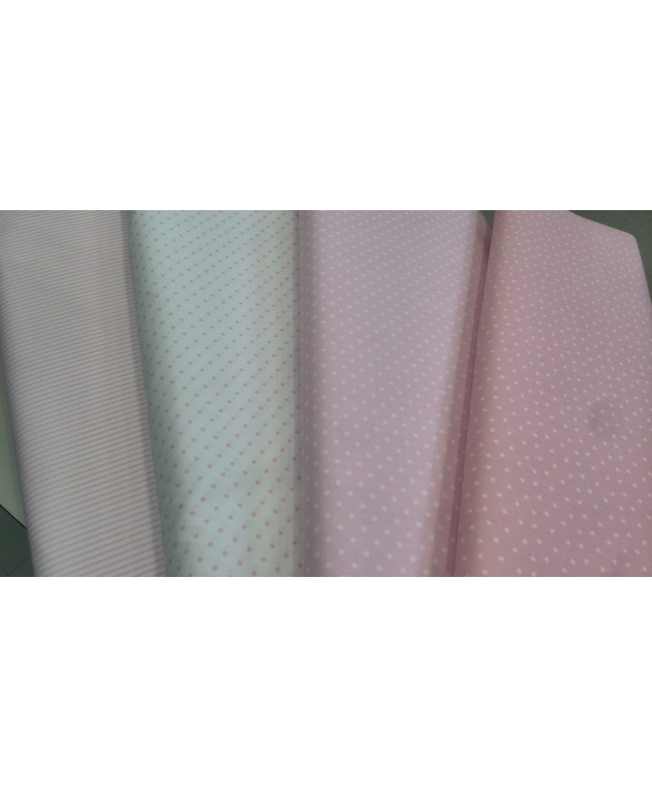 Pique canutillo fondo blanco lunar rosa 65% poliester 35% algodon 1.50 ancho