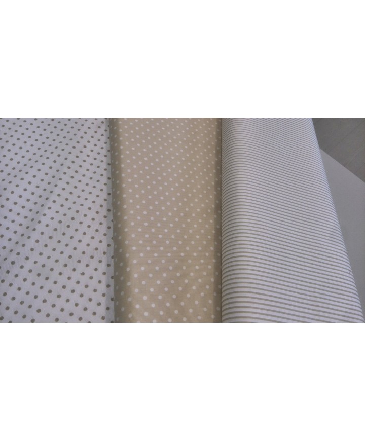 Pique canutillo blanco lunar camel 65% poliester 35% algodon  1.50 de ancho