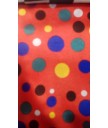 Raso fondo rojo lunares amarillo, azulon, blanco, negro y verde 1.50 de ancho 100% poliester