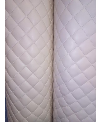 Polipiel acolchada, guateada y forrada en 1.40 de ancho beige