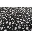 Viscosa 100% fondo negro flores blancas 1.50 m ancho