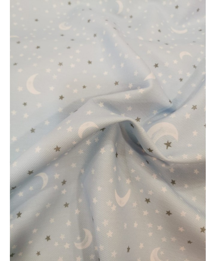 Algodon 100% fondo azúl con lunas y estrellas 1.50
