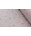 Pique canutillo 65% poliéster 35% algodón fondo rosa corazones grises, rosas y blancos 1,40 de ancho