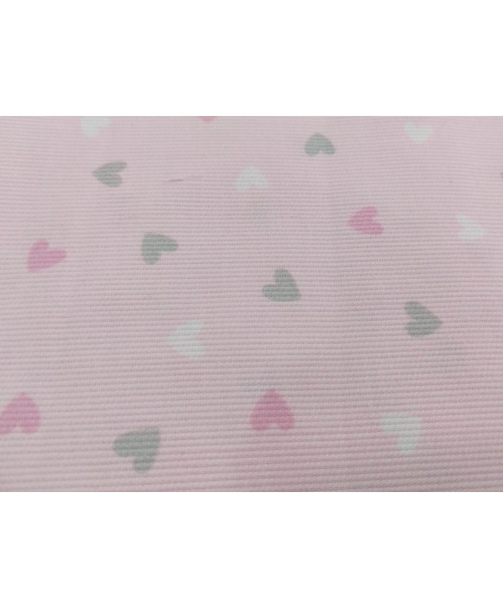 Pique canutillo 65% poliéster 35% algodón fondo rosa corazones grises, rosas y blancos 1,40 de ancho