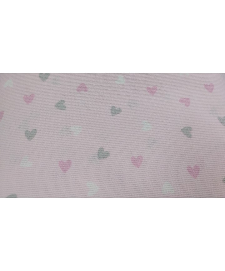 Pique canutillo 65% poliéster 35% algodón fondo rosa corazones grises, rosas y blancos 1,40 de ancho