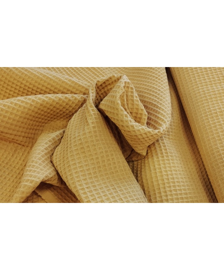 Pique waffle 100% algodón mostaza 1,50 ancho