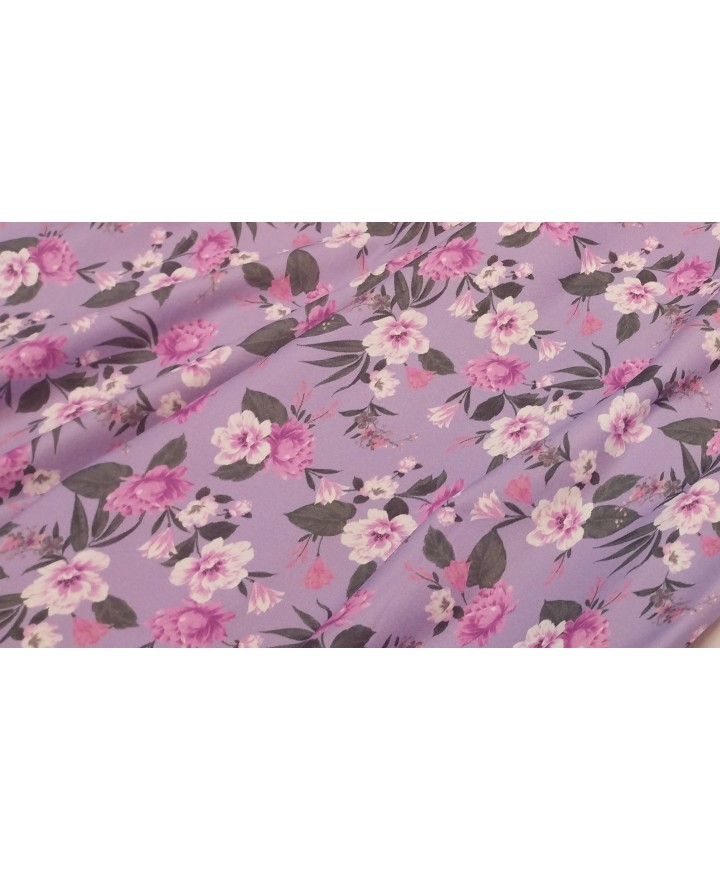 Lycra 100% elastan flores fondo malva 1.50 de ancho